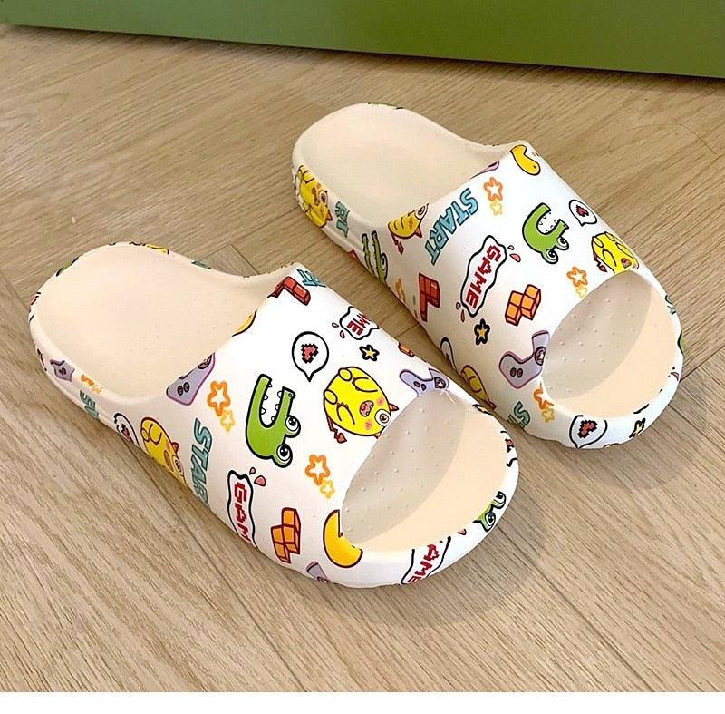 White slide sandals with colorful game icons print, open toe and thick sole