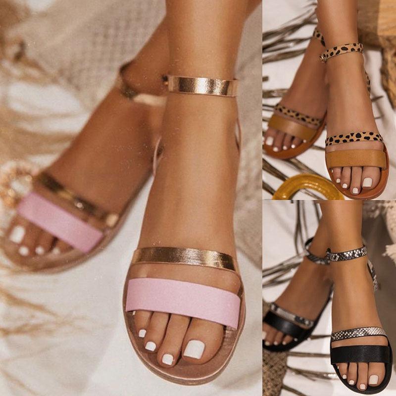 Pink-and-gold open-toe slingback sandals with leopard-print pair
