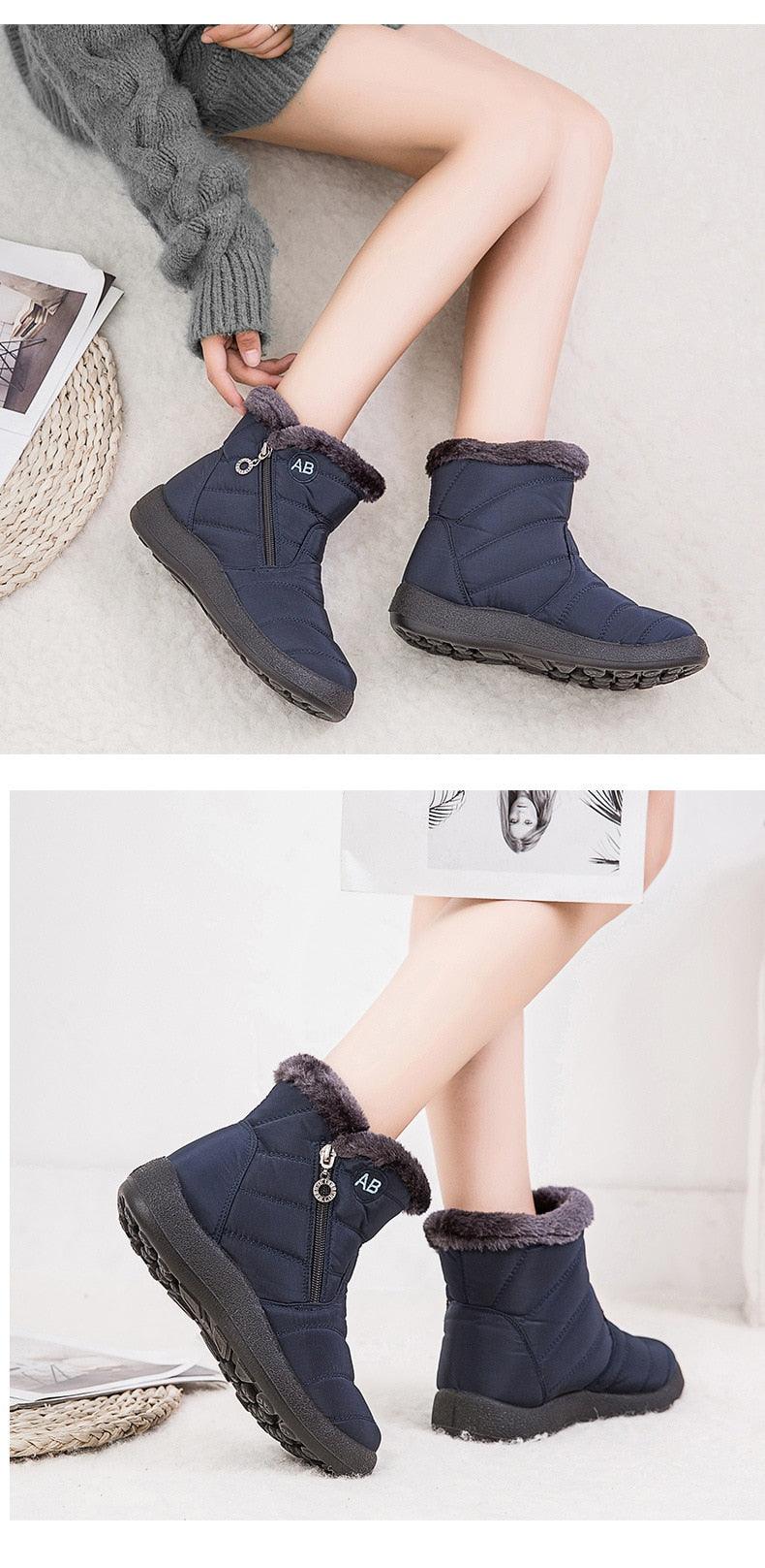 Women’s navy winter ankle boots with faux fur lining and side zipper