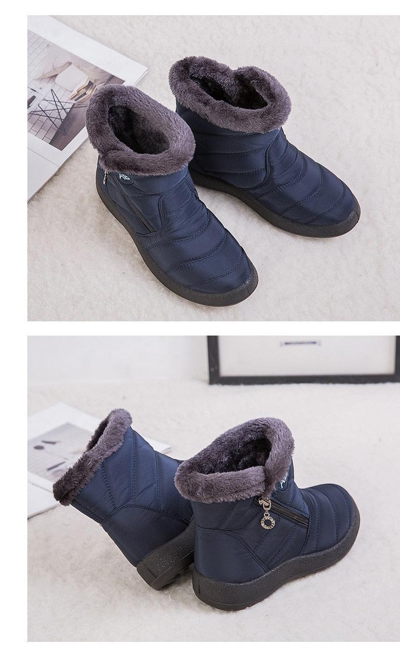 Navy short snow boots with fuzzy lining and side zipper, low profile tread