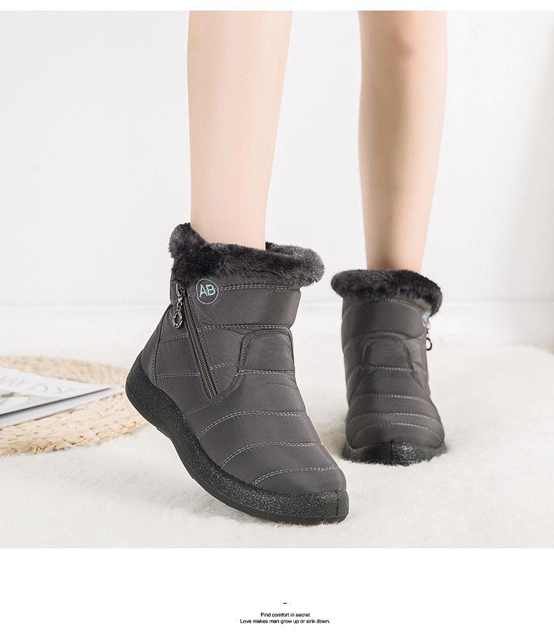 Women’s dark gray winter ankle boots with faux fur trim, side zipper, cushioned sole