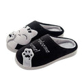 Women’s black cat slippers with plush lining, slip-on house shoes and paw print