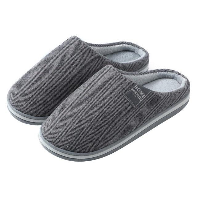 Grey herringbone slip-on slippers with cushioned lining and rubber sole