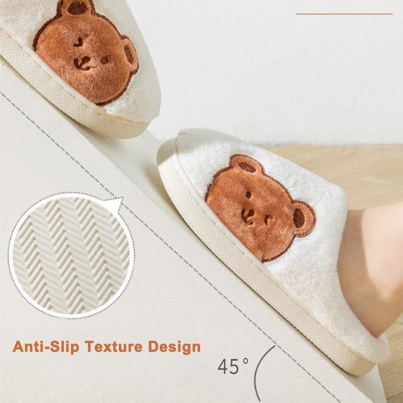 Fuzzy white slip-on slippers with bear face and textured anti-slip sole
