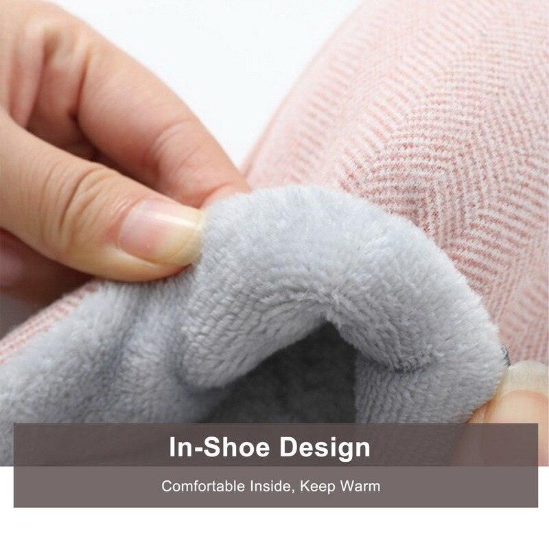 Light grey plush house slipper with soft interior lining and hand-held opening