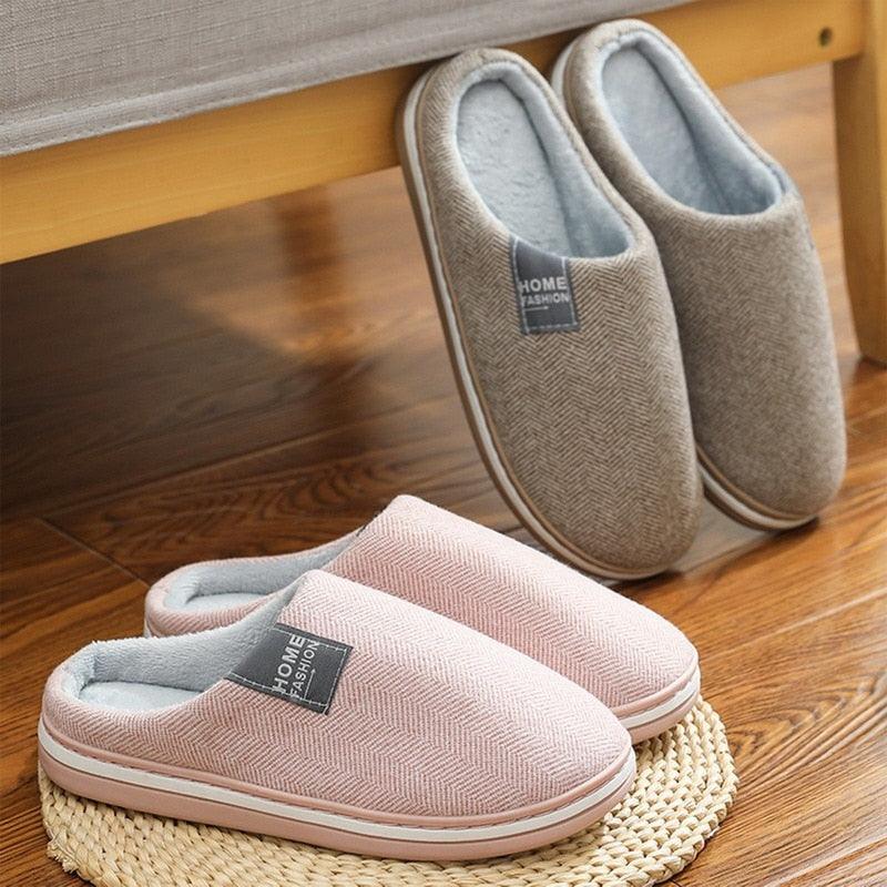 Light pink fleece-lined house slippers with soft lining and closed toe