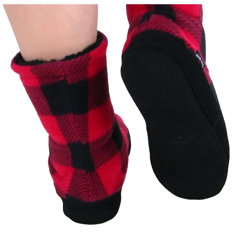 Women’s buffalo plaid snugs worn, with red-black checks and black sherpa-lined cuff