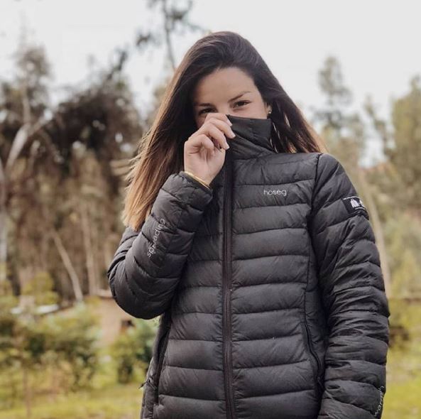 Women’s puffer alpaca jacket in dark gray/black with full-zip front and hoodless collar