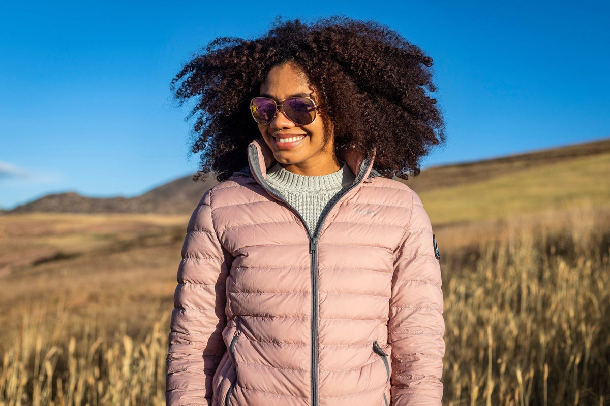Women’s puffer alpaca jacket in light mauve/pink with full-zip and stand collar