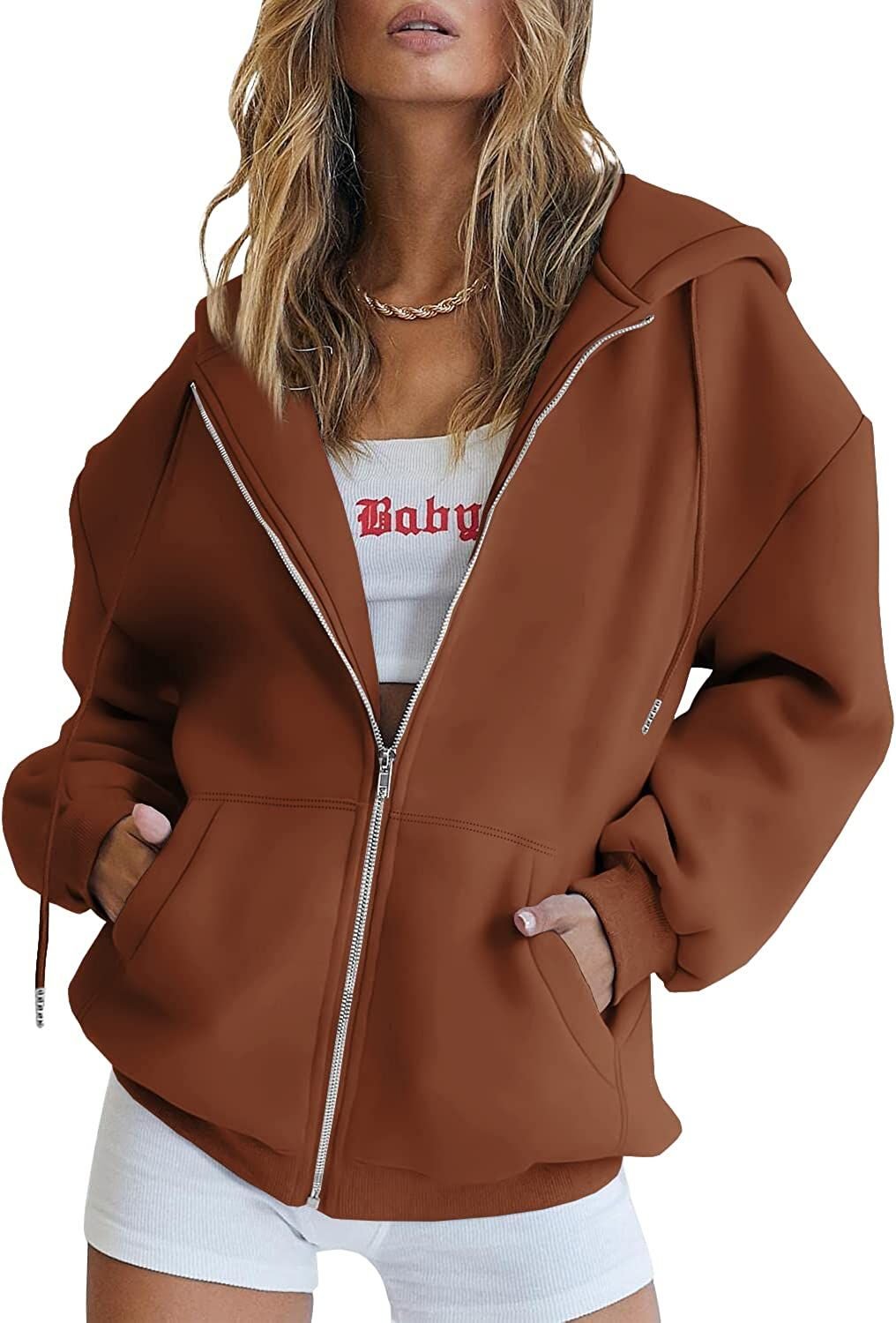 Rust brown zip-up hoodie with drawstring hood, front zipper, and kangaroo pocket