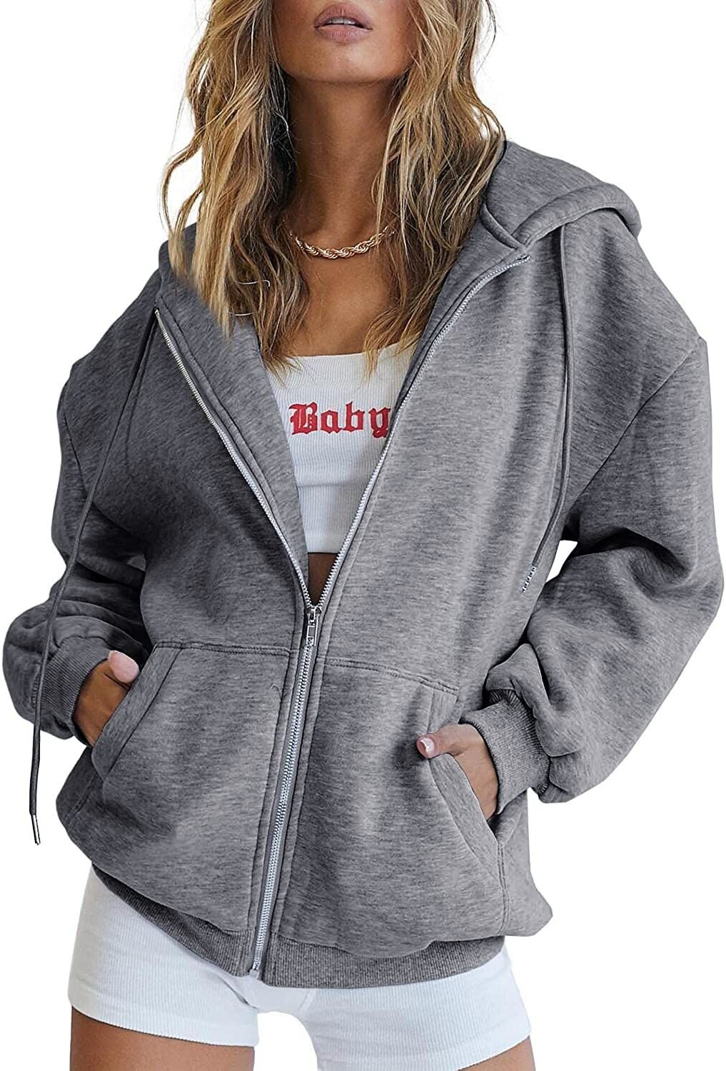 Grey zip-up hoodie with drawstring hood, full zipper, and front kangaroo pocket