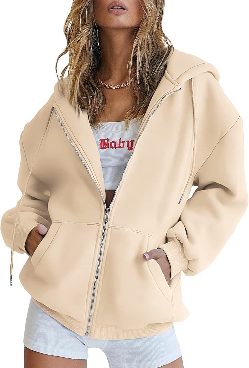 Light beige zip-up hoodie with hood and drawstring, front pockets, relaxed oversized style