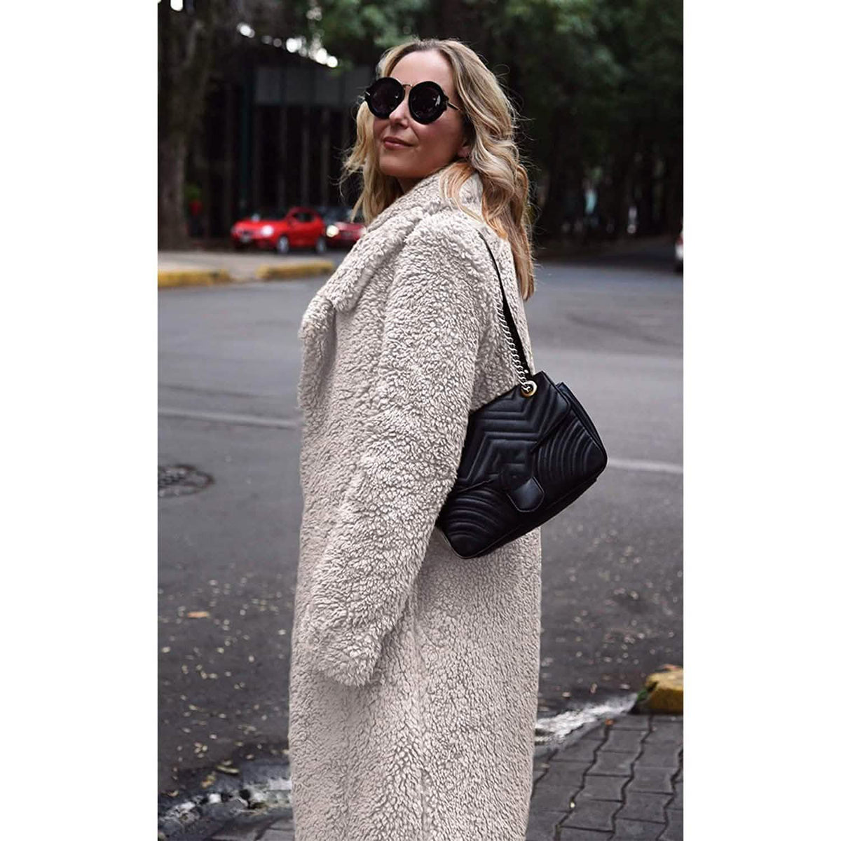 Cream fuzzy fleece long cardigan coat with lapel and open front, side profile