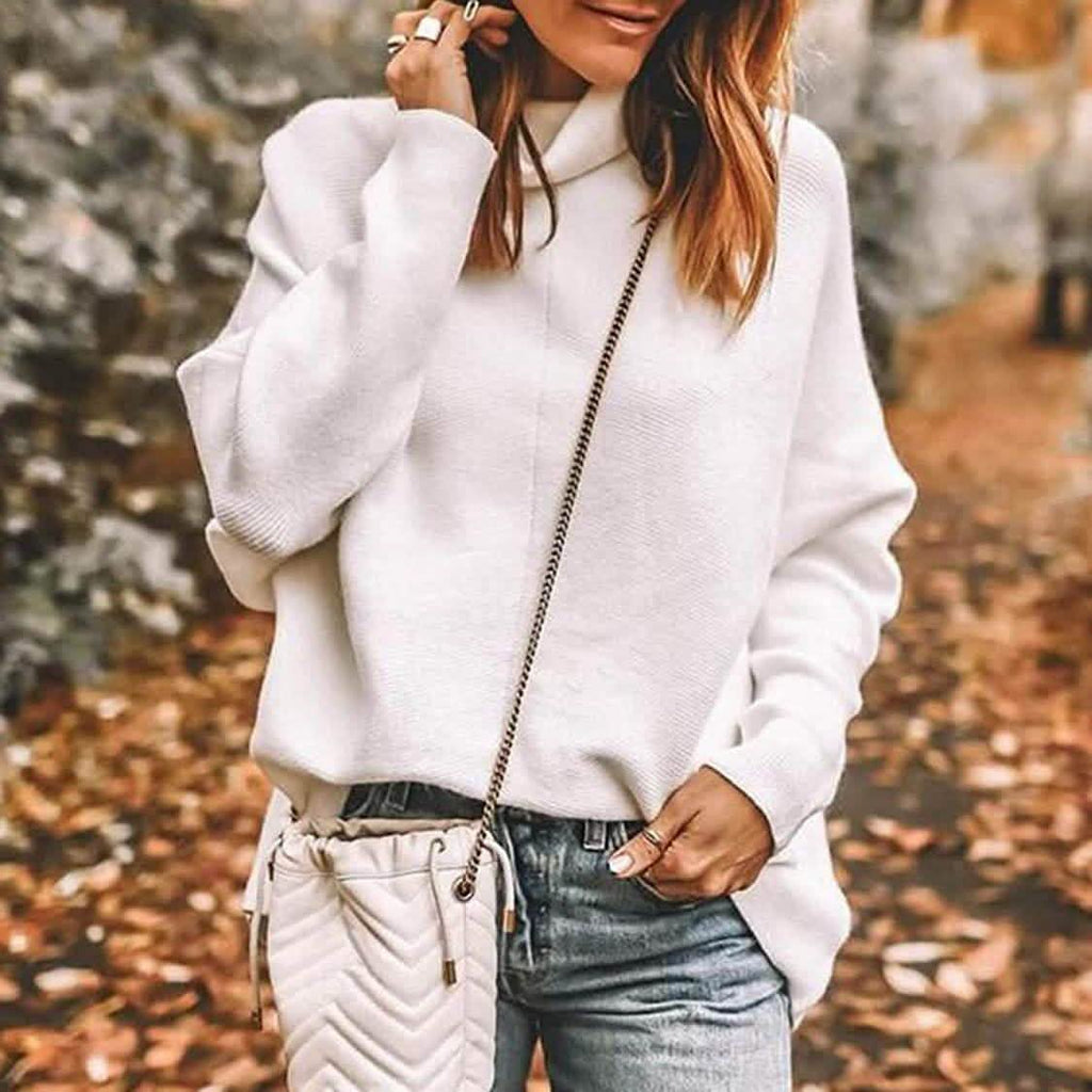 High-neck long-sleeve knit sweater in white, relaxed fit, ribbed collar and cuffs