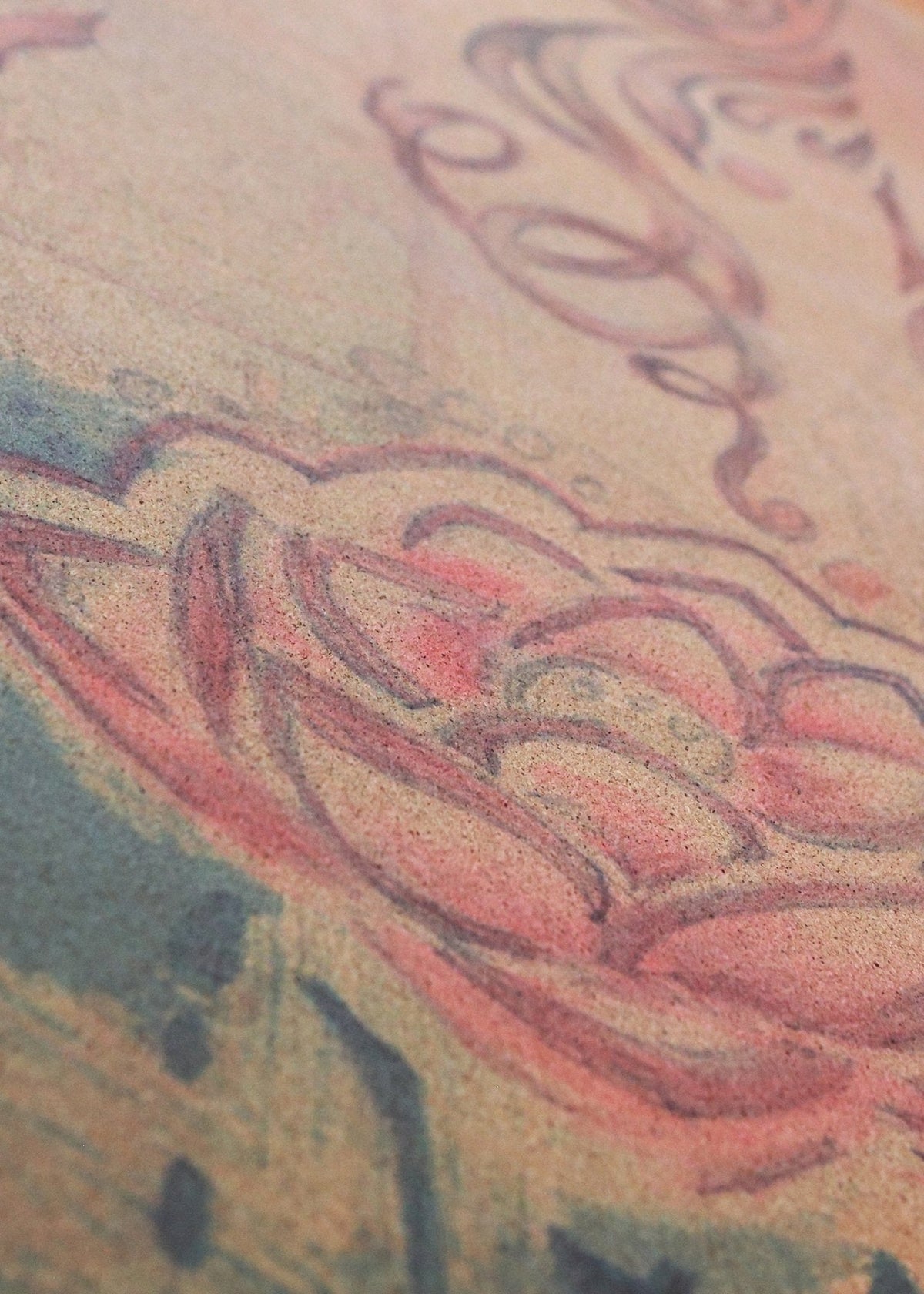 Cork travel yoga mat with a close-up of its colorful lotus and flowing line design
