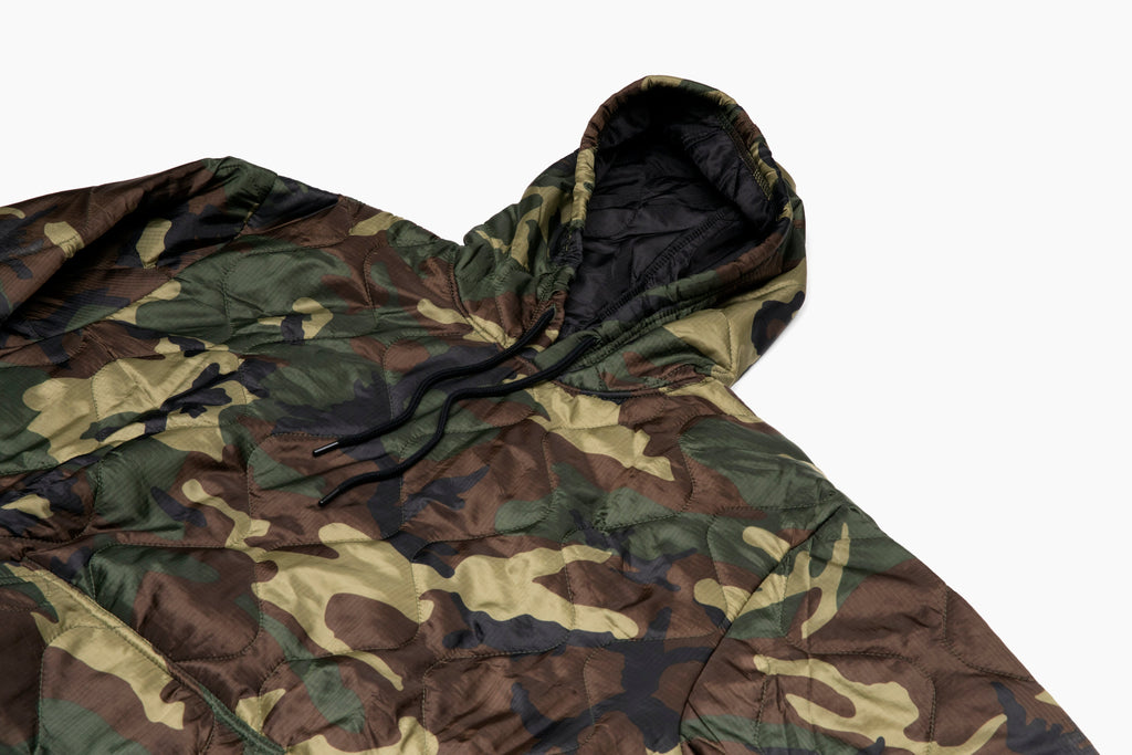 Woobie hoodie camouflage print hooded pullover with black drawstring, close-up chest.