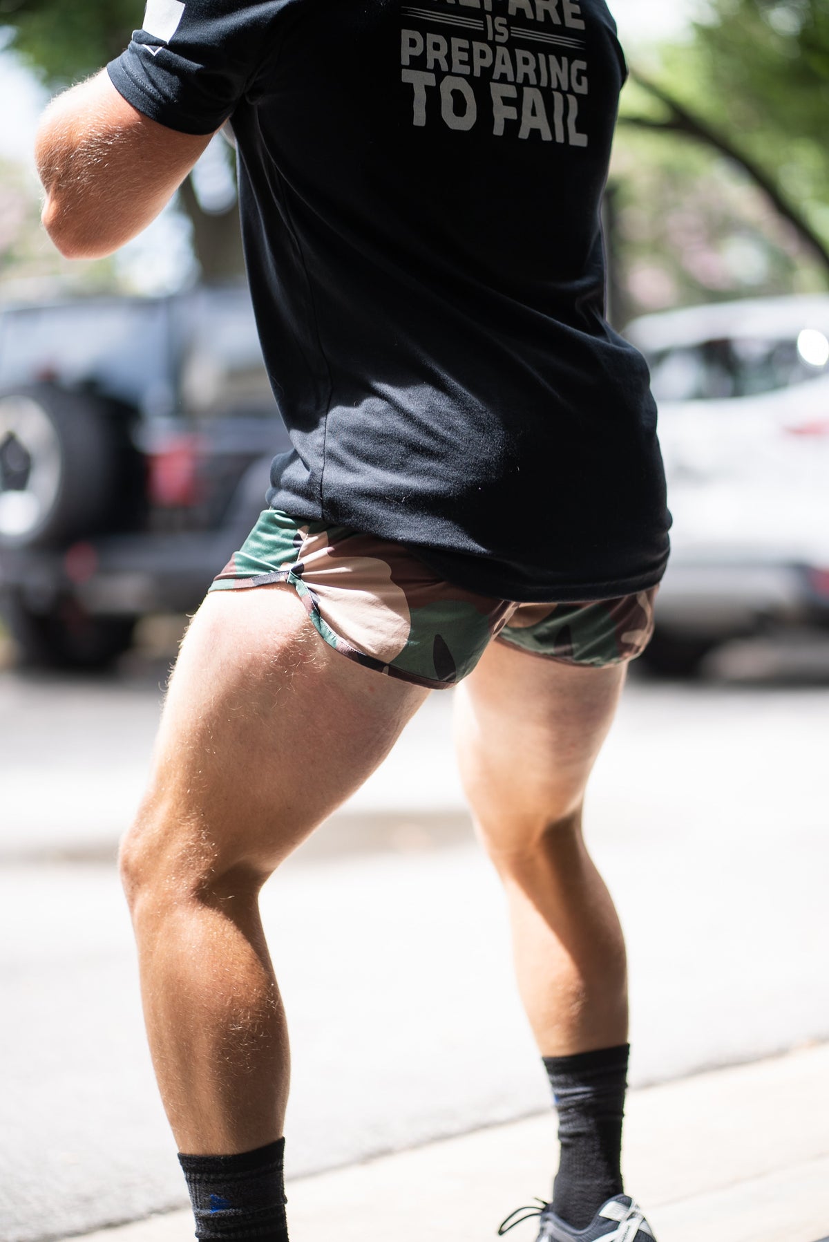 Woodland camo boxer shorts with elastic waistband, green and brown
