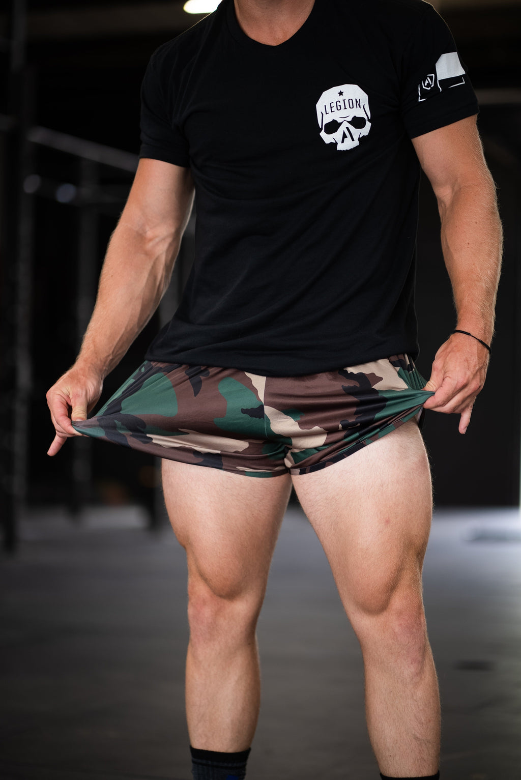 Woodland camo boxer shorts with elastic waistband, layered inner panel