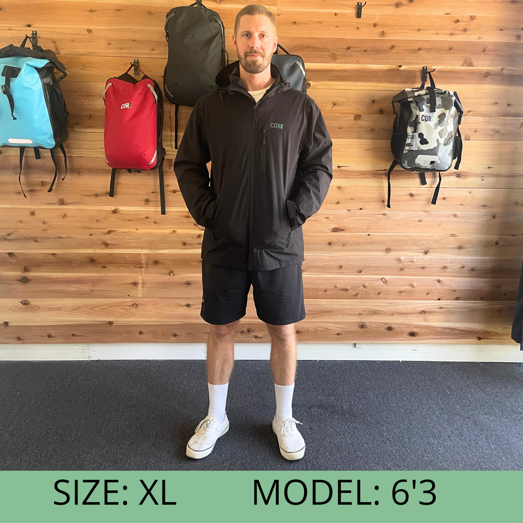 Black hooded rain jacket with full-zip front and zip pockets
