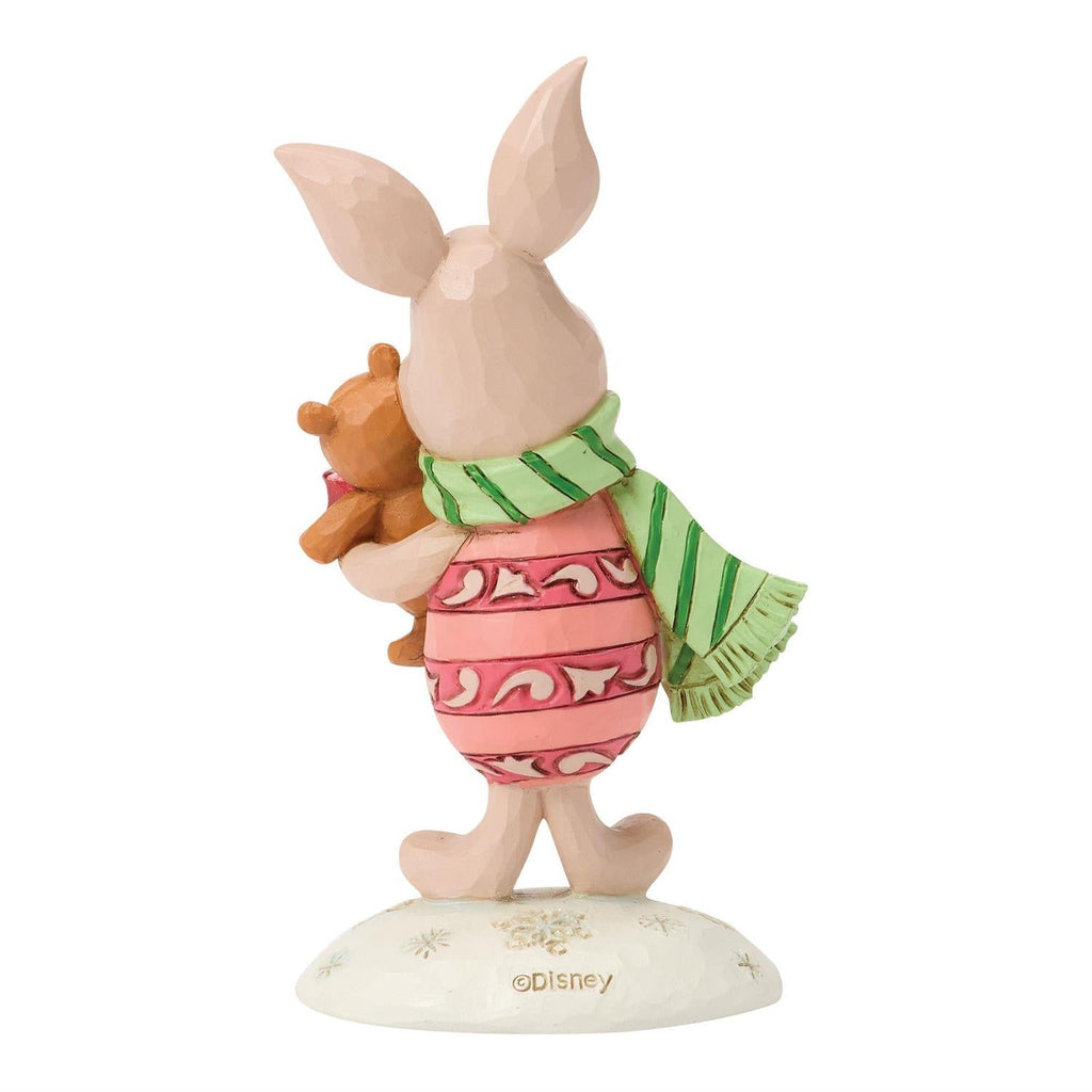 Piglet mini figurine holding teddy bear, side view; ©Disney on base