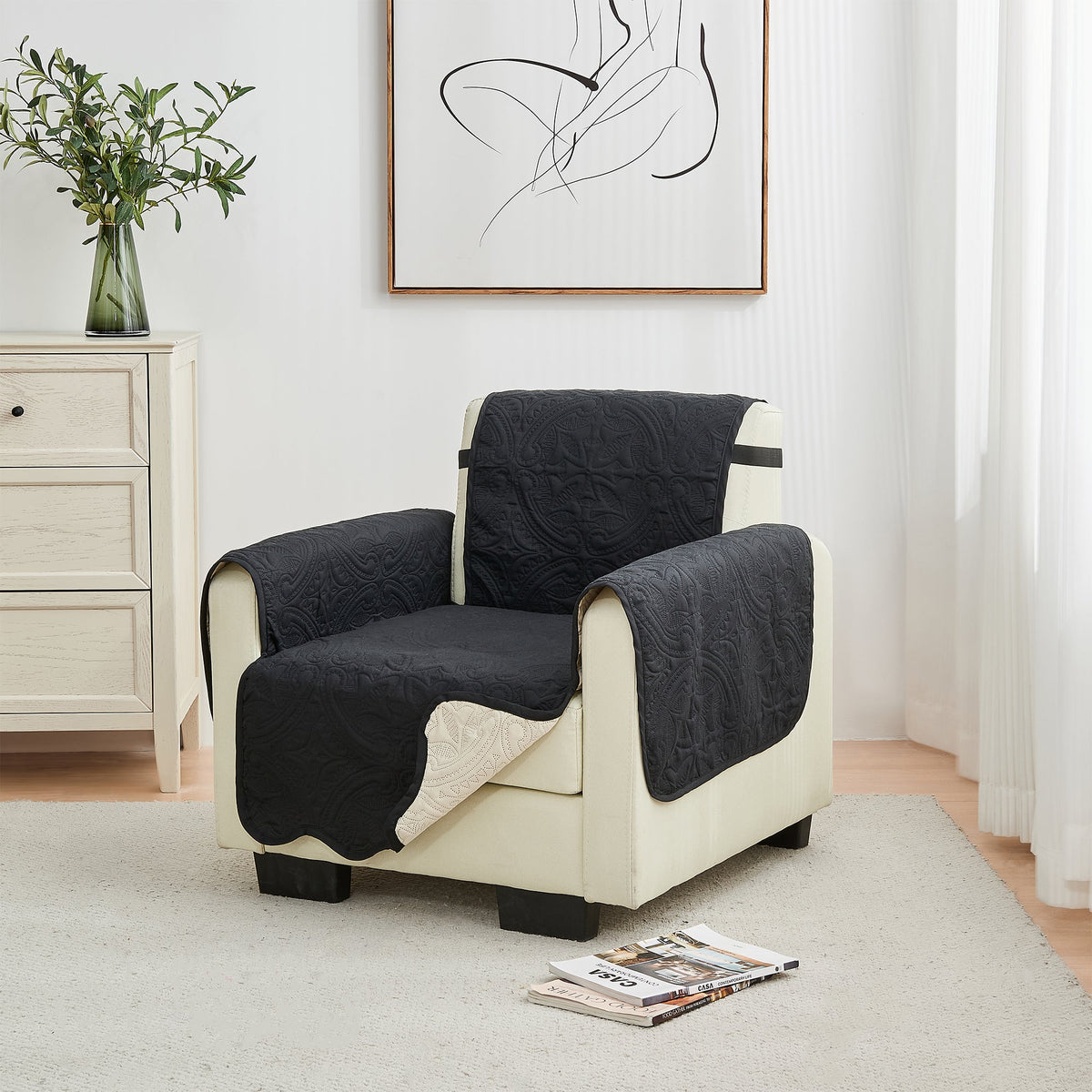 Armchair protector with dark textured quilted fabric and light beige base panels
