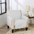 White armchair furniture protector with beige armrest covers and quilted fabric
