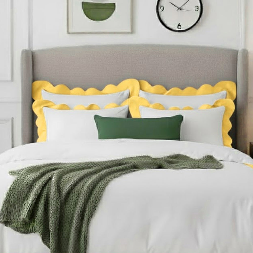 Cotton duvet cover set with yellow wavy applique border and white pillowcases