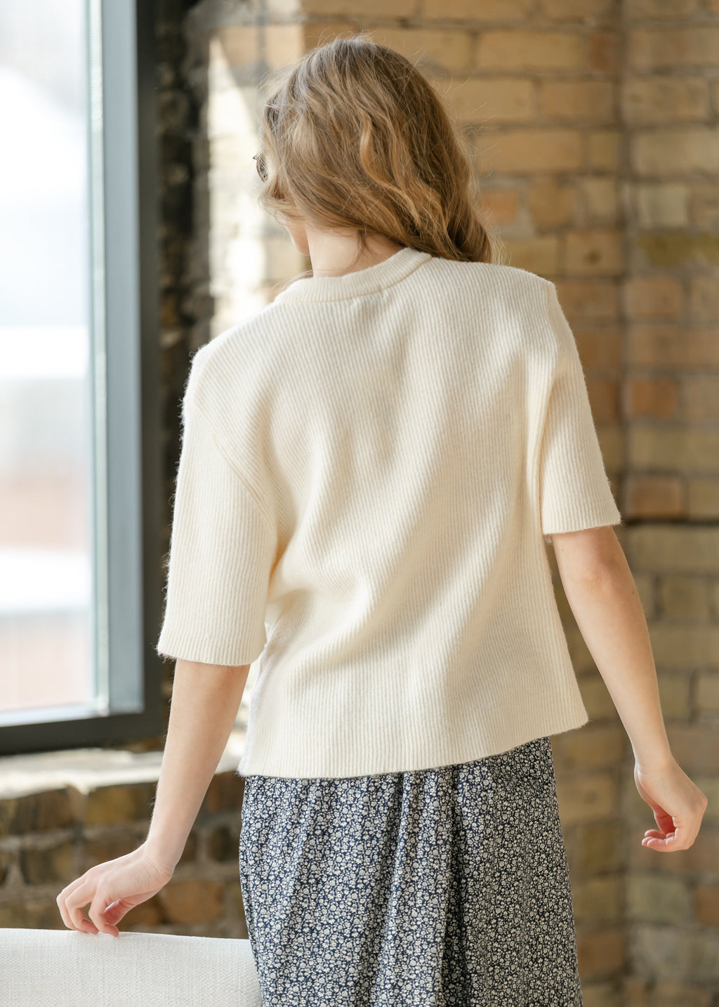 Ivory short-sleeve button cardigan with ribbed knit and crew neckline