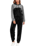 Grey and black velour hoodie and jogger pants set with drawstring hood and elastic cuffs