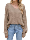 Tan cable-knit V-neck long-sleeve sweater with ribbed cuffs, oversized loose style