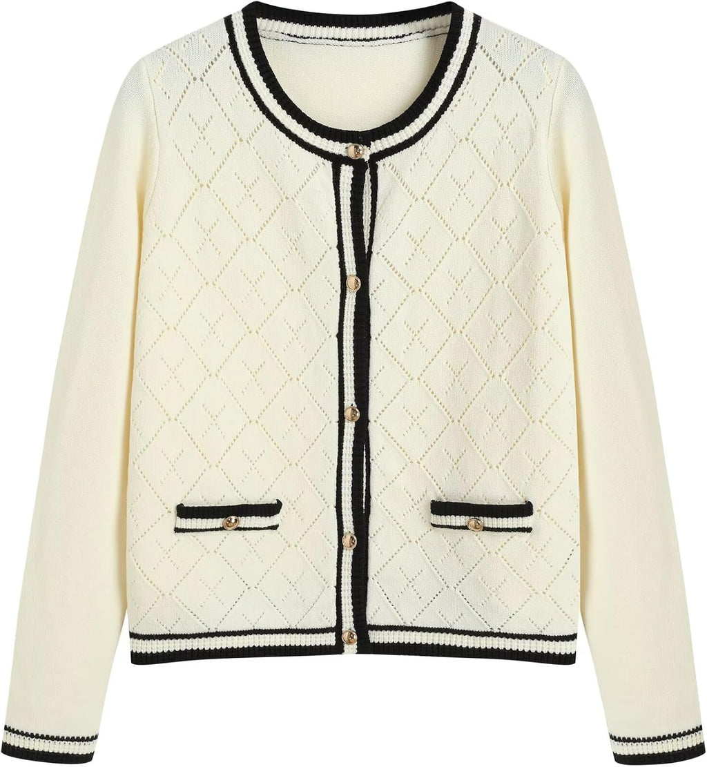 Cream knit cardigan with black trim, open front, button placket, long sleeves.