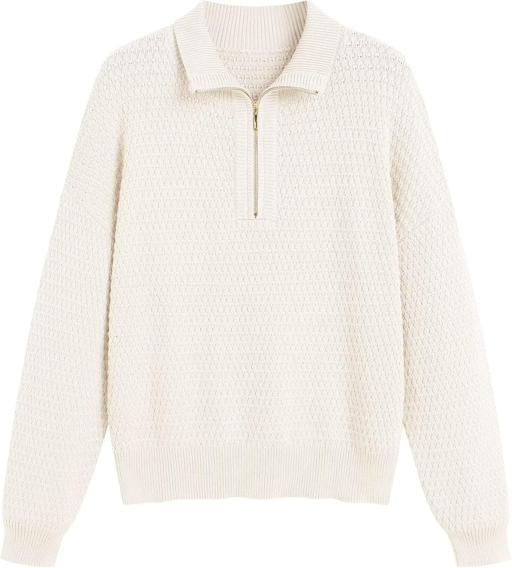 Off-white quarter-zip knit pullover sweater with ribbed collar and long sleeves.