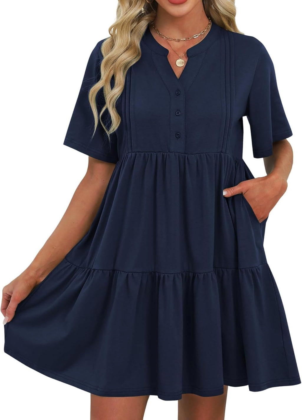 Navy blue V-neck babydoll dress with short flutter sleeves, button front, tiered skirt