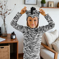 Kids zebra-print jumpsuit with long sleeves and matching headband with black tuft