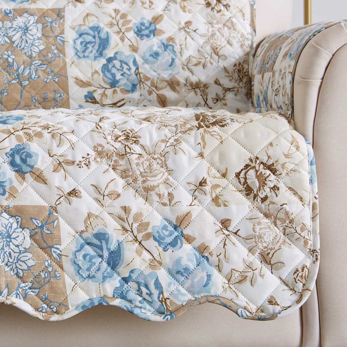 Quilted floral patchwork protector panel with blue blossoms and taupe vine detail