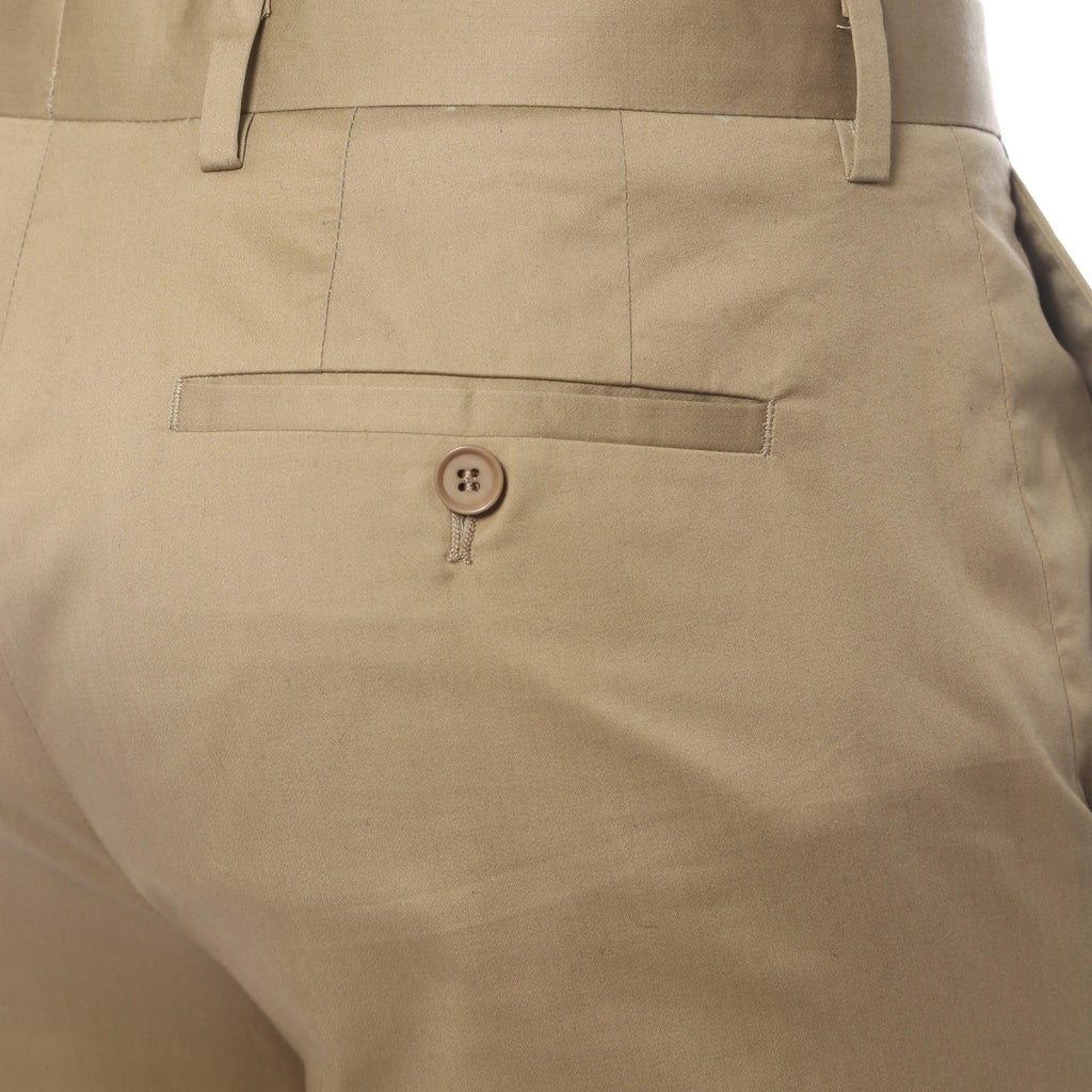 Khaki chino front with button closure, fly detail, and slash pocket